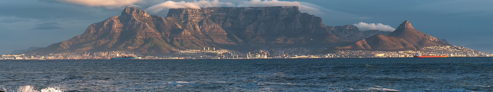 View of a distant city from the ocean